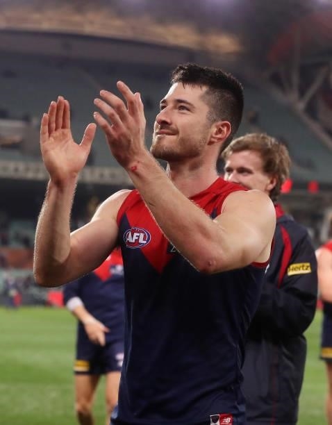 Alex Neal-Bullen of the Demons applauds the crowd after the win during the 2021 AFL First Qualifying Final match between the Melbourne Demons and the...