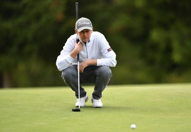 Justin Harding of Republic of South Africa look over his put at the 16th hole during Day Three of The Omega European Masters at Crans-sur-Sierre Golf...