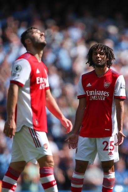 Mohamed Elneny of Arsenal reacts after conceding during the Premier League match between Manchester City and Arsenal at Etihad Stadium on August 28,...