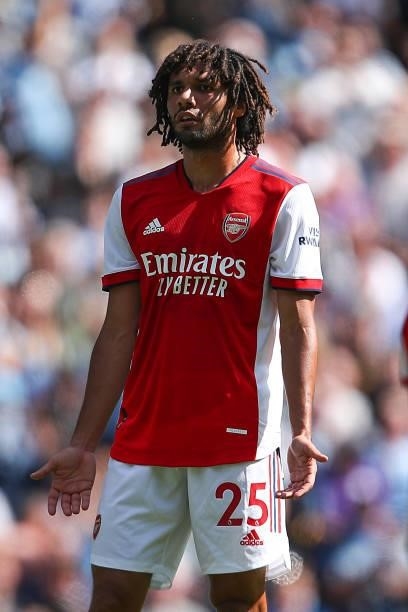 Mohamed Elneny of Arsenal reacts after conceding during the Premier League match between Manchester City and Arsenal at Etihad Stadium on August 28,...