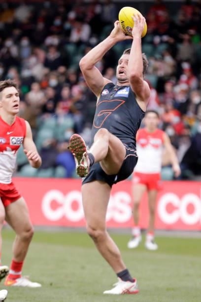 Jesse Hogan of the Giants marks the ball during the 2021 AFL Second Elimination Final match between the Sydney Swans and the GWS Giants at University...