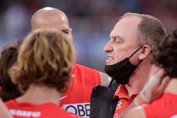 John Longmire, Senior Coach of the Swans addresses his players during the 2021 AFL Second Elimination Final match between the Sydney Swans and the...