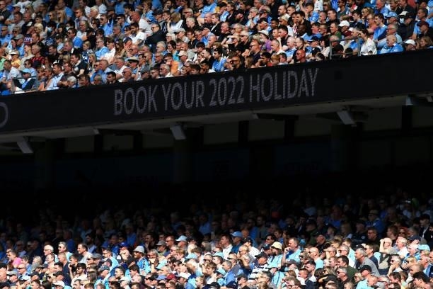 Manchester City fans look on during the Premier League match between Manchester City and Arsenal at Etihad Stadium on August 28, 2021 in Manchester,...