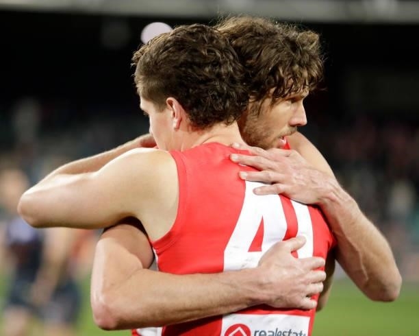 Tom Hickey of the Swans and Hayden McLean of the Swans looks dejected after a loss during the 2021 AFL Second Elimination Final match between the...