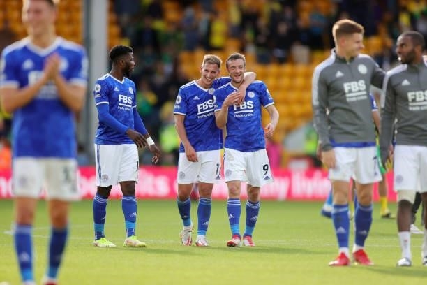 Jamie Vardy of Leicester City, Marc Albrighton of Leicester City and Kelechi Iheanacho of Leicester City celebrate after the final whistle of the...