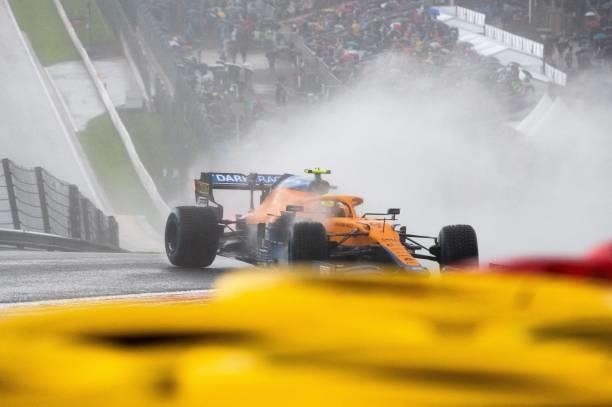 McLaren's British driver Lando Norris crashes in the qualifying session of the Formula One Belgian Grand Prix at the Spa-Francorchamps circuit in Spa...