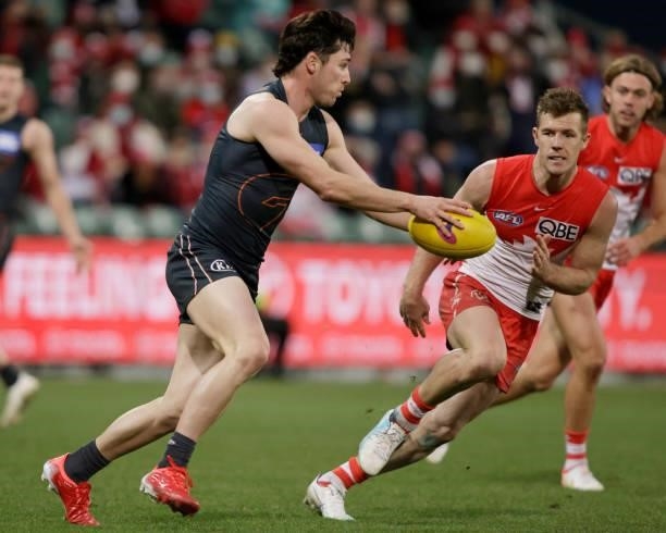 Lachie Ash of the Giants kicks the ball during the 2021 AFL Second Elimination Final match between the Sydney Swans and the GWS Giants at University...