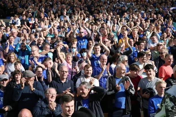 Leicester City fans celebrate after the Premier League match between Norwich City and Leicester City at Carrow Road on August 28, 2021 in Norwich,...