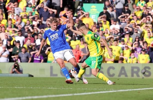 Marc Albrighton of Leicester City in action with Milot Rashica of Norwich City during the Premier League match between Norwich City and Leicester...