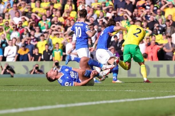 Marc Albrighton of Leicester City holds his ankle in pain during the Premier League match between Norwich City and Leicester City at Carrow Road on...