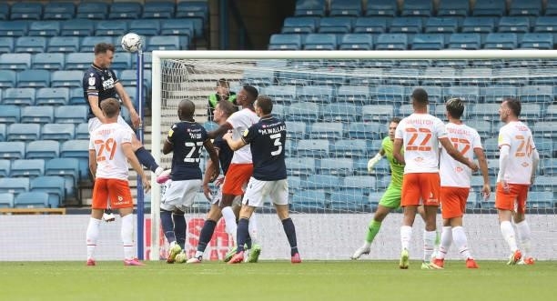 Millwall's Jake Cooper scores his side's second goal during the Sky Bet Championship match between Millwall and Blackpool at The Den on August 28,...