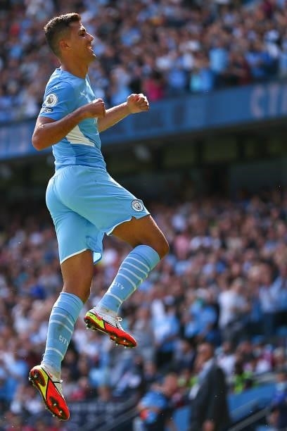 Rodri of Manchester City celebrates after scoring a goal to make it 4-0 during the Premier League match between Manchester City and Arsenal at Etihad...