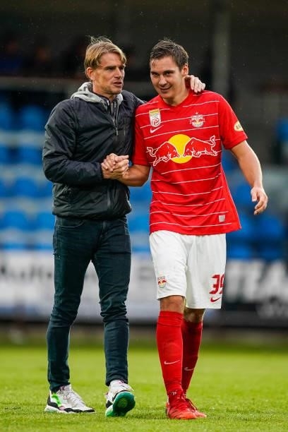 Sports Director Christoph Freund and Maximilian Woeber of FC Red Bull Salzburg shake hands after the Admiral Bundesliga match between TSV Hartberg...
