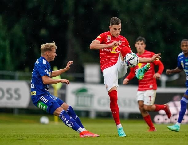 Marcel Schantl of TSV Hartberg in action against Luka Sucic of FC Red Bull Salzburg during the Admiral Bundesliga match between TSV Hartberg and FC...