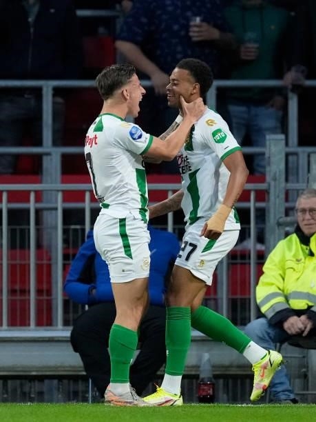 Cyril Ngonge of FC Groningen celebrates with Tomas Suslov of FC Groningen during the Dutch Eredivisie match between PSV v FC Groningen at the Philips...