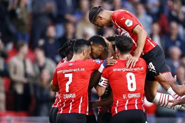 Celebrate the 1-0 against Cody Gakpo of PSV Eindhoven during the Dutch Eredivisie match between PSV Eindhoven and FC Groningen at Phillips Stadium on...