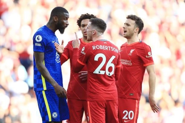 Diogo Jota of Liverpool and Trent Alexander-Arnold of Liverpool attempt to calm the situation as Andrew Robertson of Liverpool and Antonio Rudiger of...