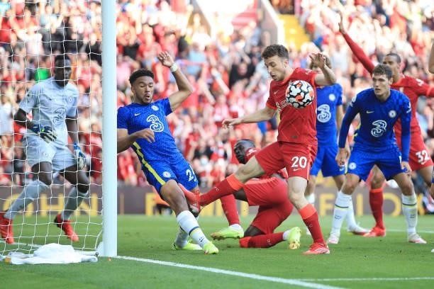Diogo Jota of Liverpool battles with Reece James of Chelsea on the Chelsea goal line during the Premier League match between Liverpool and Chelsea at...
