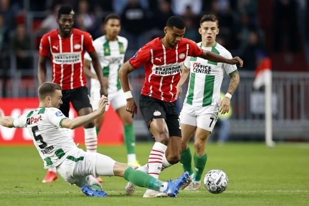 Mike te Wierik of FC Groningen, Cody Gakpo or PSV Eindhoven during the Dutch Eredivisie match between PSV Eindhoven and FC Groningen at Phillips...