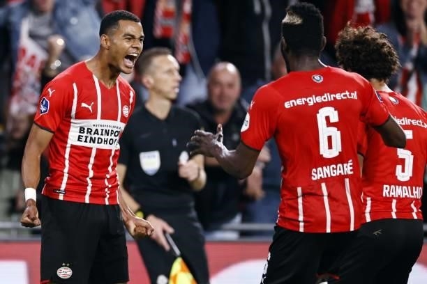 Cody Gakpo of PSV Eindhoven, Ibrahim Sangare of PSV Eindhoven, Andre Ramalho of PSV Eindhoven celebrate the 3-2 during the Dutch Eredivisie match...