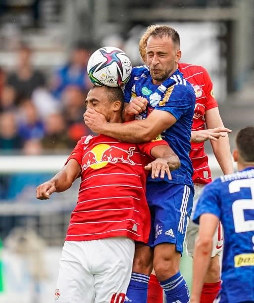 Antoine Bernede of FC Red Bull Salzburg in action against Tobias Kainz of TSV Hartberg during the Admiral Bundesliga match between TSV Hartberg and...