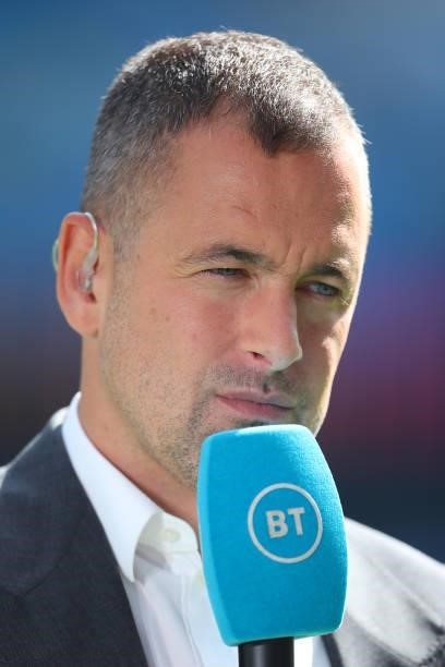 Joe Cole reporting for BT Sport during the Premier League match between Manchester City and Arsenal at Etihad Stadium on August 28, 2021 in...