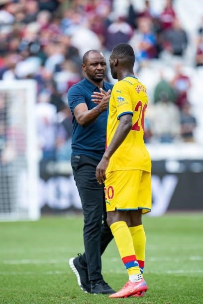 Manager Patrick Vieira and Christian Benteke of Crystal Palace during the Premier League match between West Ham United and Crystal Palace at London...