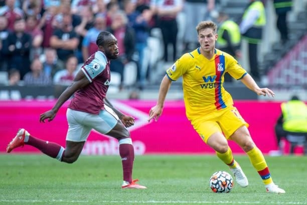 Michail Antonio of West Ham United and Joachim Andersen of Crystal Palace in action during the Premier League match between West Ham United and...