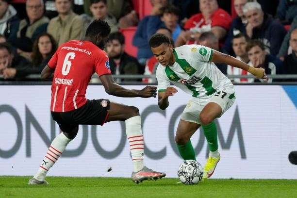 Ibrahim Sangare of PSV, Cyril Ngonge of FC Groningen during the Dutch Eredivisie match between PSV v FC Groningen at the Philips Stadium on August...