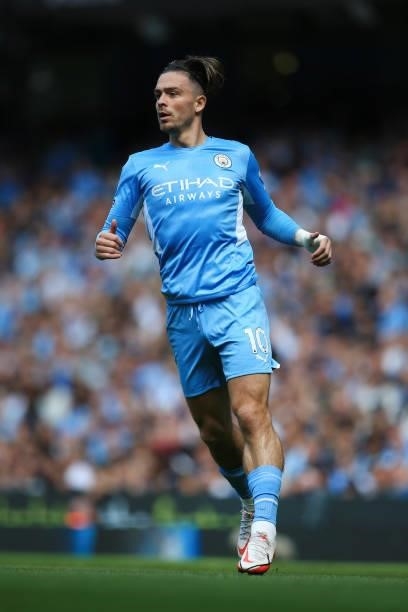 Jack Grealish of Manchester City looks on during the Premier League match between Manchester City and Arsenal at Etihad Stadium on August 28, 2021 in...