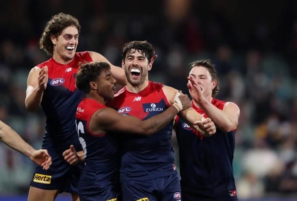 Christian Petracca celebrates a goal with team mates Tom Sparrow, Luke Jackson, Kysaiah Pickett during the 2021 AFL First Qualifying Final match...