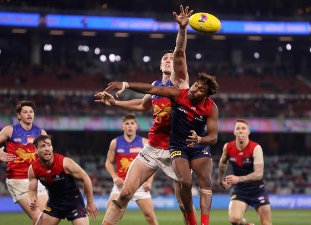 Oscar McInerney of the Lions and Kysaiah Pickett of the Demons during the 2021 AFL First Qualifying Final match between the Melbourne Demons and the...