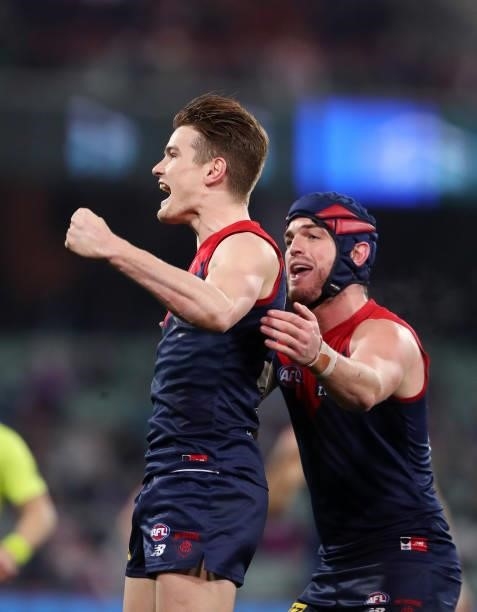 Bayley Fritsch of the Demons celebrates a goal with Angus Brayshaw during the 2021 AFL First Qualifying Final match between the Melbourne Demons and...
