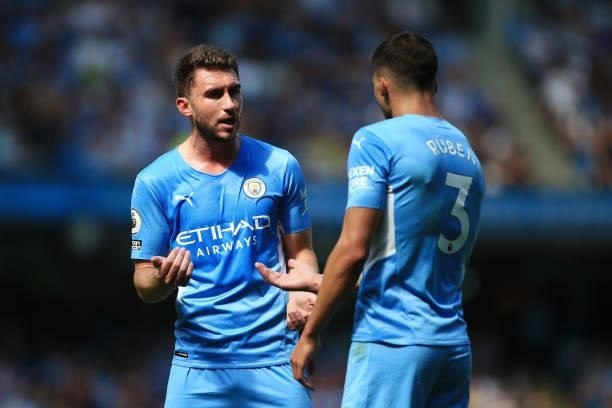 Aymeric Laporte of Manchester City and Ruben Dias of Manchester City talk to each other during the Premier League match between Manchester City and...