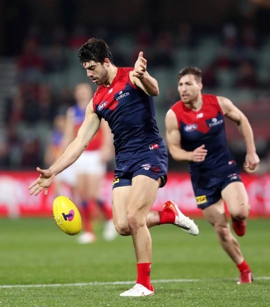 Christian Petracca of the Demons and Jack Viney during the 2021 AFL First Qualifying Final match between the Melbourne Demons and the Brisbane Lions...