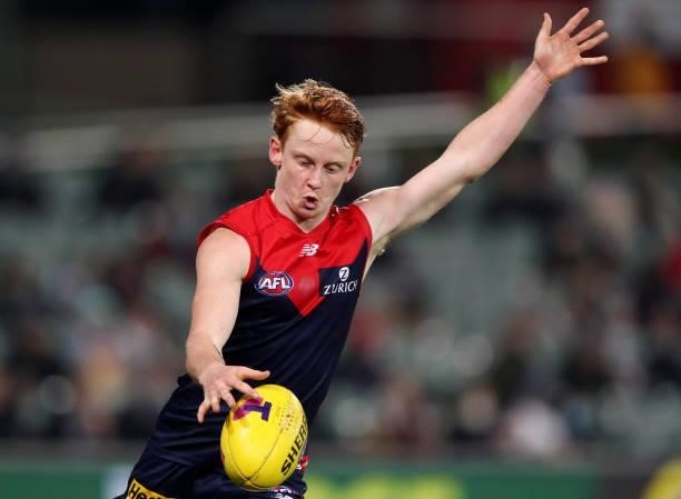 Jake Bowey of the Demons kicks the ball during the 2021 AFL First Qualifying Final match between the Melbourne Demons and the Brisbane Lions at...