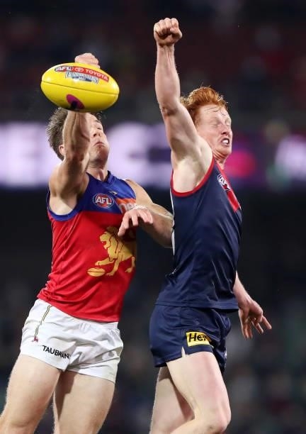 Lincoln McCarthy of the Lions and Jake Bowey of the Demonsduring the 2021 AFL First Qualifying Final match between the Melbourne Demons and the...