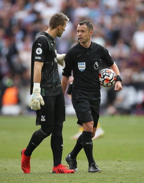 Crystal Palace goalkeeper Vicente Guaita in conversation with referee Stuart Attwell during the Premier League match between West Ham United and...
