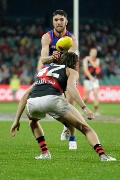 Bailey Williams of the Bulldogs handpasses the ball during the 2021 AFL First Elimination Final match between the Western Bulldogs and the Essendon...