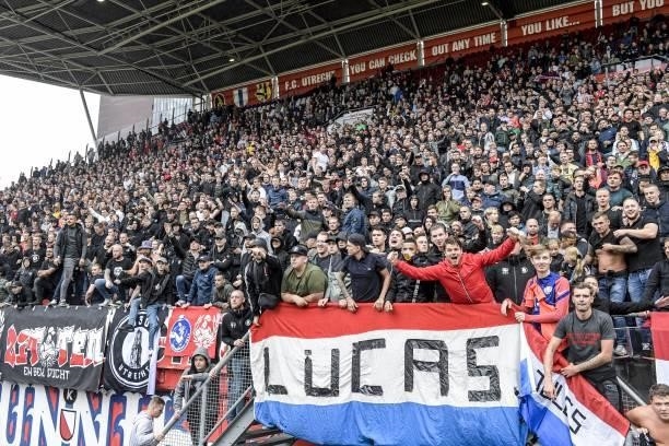Utrecht supporters celebrate the victory during the Dutch Eredivisie match between FC Utrecht and Feyenoord at Stadion Galgenwaard on August 29, 2021...