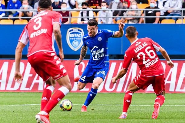 Giulian Biancone of Troyes attempts a kick during the Ligue 1 Uber Eats match between Troyes and Monaco at Stade de l'Aube on August 29, 2021 in...