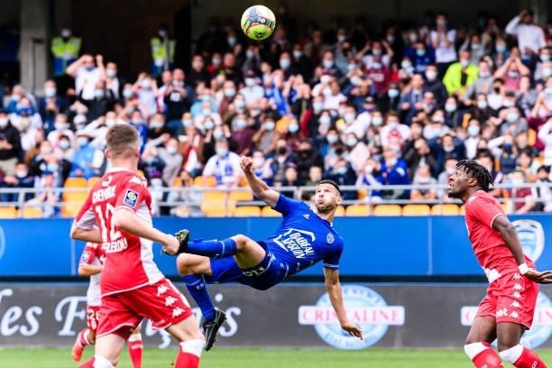 Yoann Touzghar of Troyes attempts a bicycle kick during the Ligue 1 Uber Eats match between Troyes and Monaco at Stade de l'Aube on August 29, 2021...