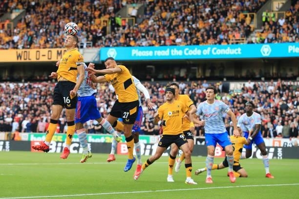 Conor Coady of Wolverhampton Wanderers gets his head to the ball during the Premier League match between Wolverhampton Wanderers and Manchester...