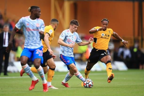 Daniel James of Manchester United battles with Adama Traore of Wolverhampton Wanderers during the Premier League match between Wolverhampton...