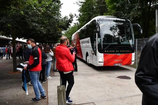 Fans welcome Reims bus near the stadium during the Ligue 1 Uber Eats match between Reims and Paris Saint Germain at Stade Auguste Delaune on August...