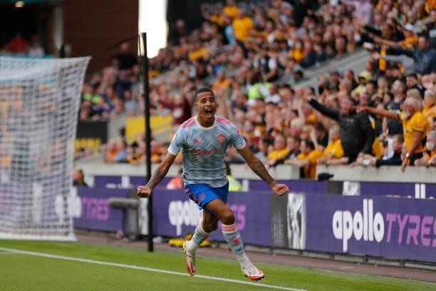 Mason Greenwood of Manchester United celebrates after scoring a goal to make it 0-1 during the Premier League match between Wolverhampton Wanderers...