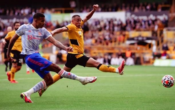 Mason Greenwood of Manchester United scores a goal to make the score 0-1 during the Premier League match between Wolverhampton Wanderers and...