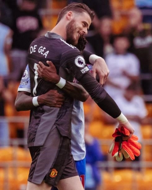 Fred of Manchester United celebrates with David de Gea during the Premier League match between Wolverhampton Wanderers and Manchester United at...
