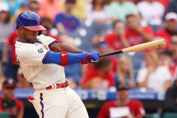 Andrew McCutchen of the Philadelphia Phillies hits an RBI single against the Arizona Diamondbacks during the first inning of a game at Citizens Bank...