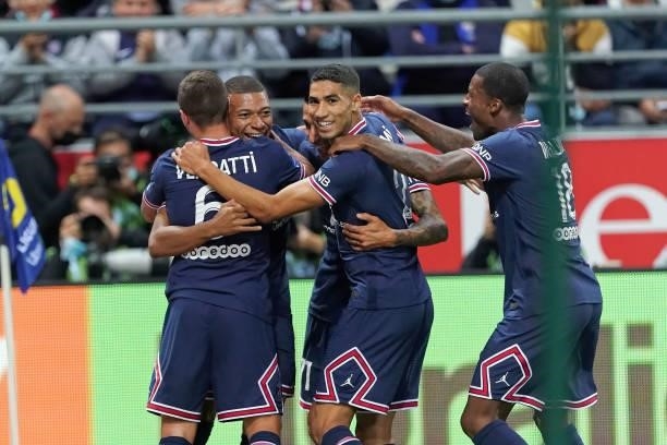 Kylina Mbappe celebrates with teammates after scoring 1st goal during the Ligue 1 Uber Eats match between Reims and Paris Saint Germain at Stade...